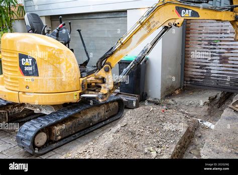 digging drain ditch with mini excavator